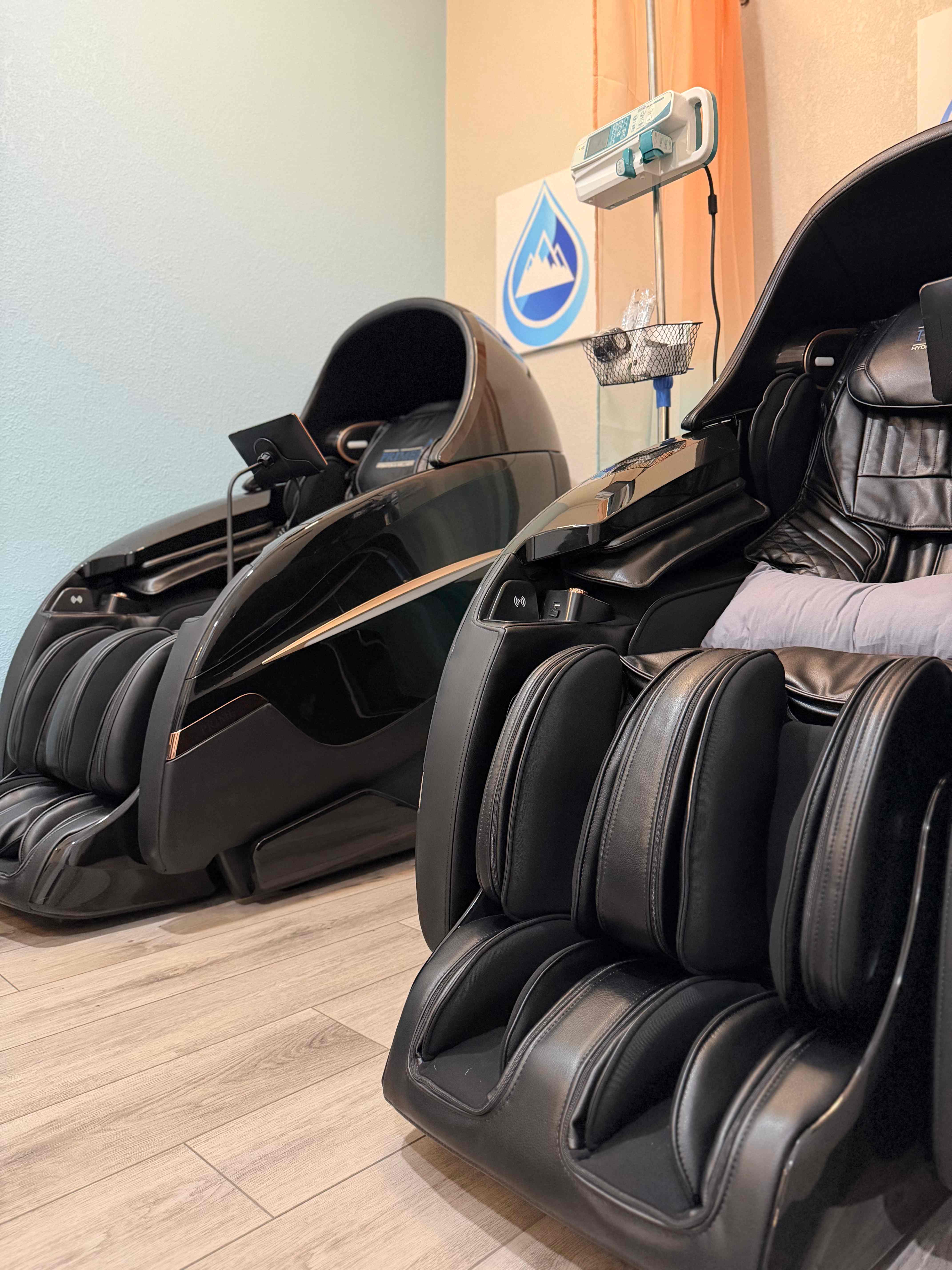 Zero-gravity massage chairs for IV therapy sessions